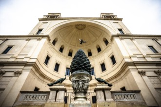 Monumental pine cone fountain with sculptures in an inner courtyard of the Vatican, Rome