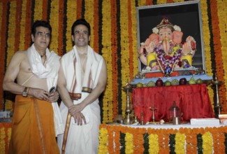 Bollywood actor Jeetendra with his son and actor Tusshar Kapoor during the Ganesh Chaturthi
