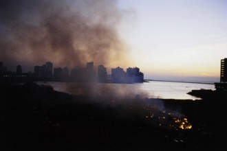 Slums burning in fire, Colaba, Mumbai, Maharashtra, India, Asia