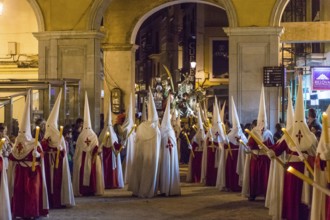 Hooded brothers, Holy Week in the Plaza Major, Holy Thursday procession, Palma, Mallorca, Balearic