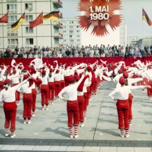 198005010100, East Berlin, 01.05.1980, Karl-Marx-Allee, sportswomen with scarves during a