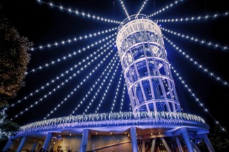 Lighthouse of the night view of Enoshima (sea candles). Shooting Location: Kamakura, Kanagawa