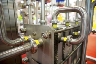 Milk pasteurization system is shown at a food and drink exhibition. Heat Treatments. Pasteurization