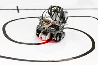 Open competition of self-made robots among school students. A robot made of Lego blocks