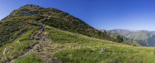 Couple ascending the path, Montcorbison, Aran Valley, Lérida province, Spain, Europe