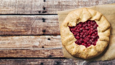 Perfect raspberry galette. Delicious rustic homemade tart with frozen or fresh raspberries on old