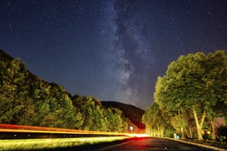 Milky Way galaxy on the side of the highway near Ulm with car trails