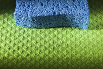New blue sponge on washcloth