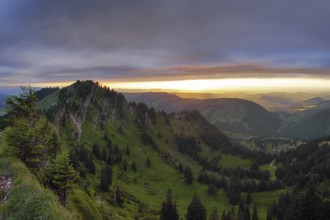 Panoramic view of a light and weather scene over the foothills of the Alps, taken from the
