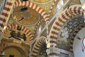 Domes with mosaics, neo-Romanesque-Byzantine Marian pilgrimage church Basilica Notre Dame de la