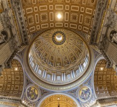 A picture of the huge dome of the St. Peter's Basilica and the surrounding frescoes and