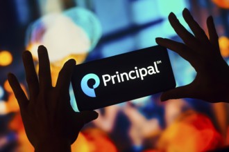 In this photo illustration, the Principal Financial Group logo is displayed on a smartphone mobile
