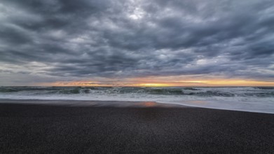 A very colorful and dramatic sunset over the Pacific Ocean