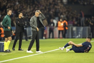 Football match, Achraf HAKIMI Paris Saint Germain right on the ground with pain in his left leg,