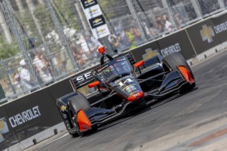 INDYCAR driver, SANTINO FERRUCCI (14) of Woodbury, Connecticut, travels through the turns in his AJ