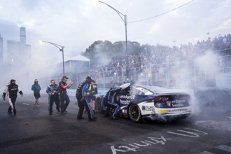 NASCAR Cup Driver, Shane van Gisbergen (91), celebrates his win for the Inaugural Grant Park 220 on