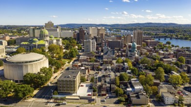 Afternoon light hits the buildings and downtown city center area in Pennsylvania state capital at