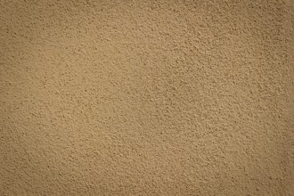 Orange wall background and texture with vignetting and blank copyspace for text or advertising