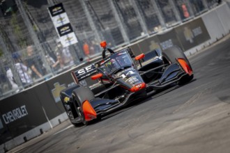INDYCAR driver, SANTINO FERRUCCI (14) of Woodbury, Connecticut, travels through the turns in his AJ