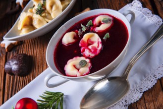 Traditional Polish Christmas Eve borscht with dumplings