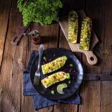 Grilled zucchini stuffed with sheep's cheese and paprika