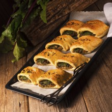 Szczecin pastries- deep-fried yeast dough stuffed with meat or vegetarian filling