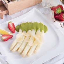 White asparagus with green sauce
