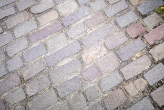 An image of a cobblestone street background texture