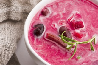 Beet root european soup called borscht with parsley