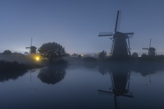 Foggy moonlit night at Kinderdijk, Netherlands