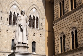 Statue of Sallustio Bandini at the Piazza Salimbeni in Siena, Italy, Europe