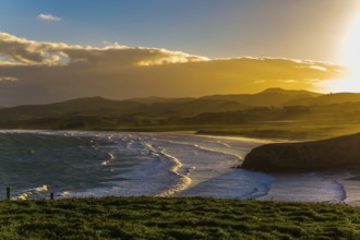Picturesque Pacific coast of sunset. Concept of active and ecological tourism. Exotic journey to