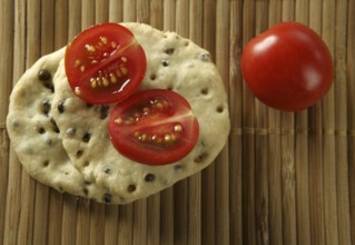 Sesame seeds biscuits over bamboo stripes