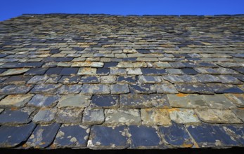 Slate moss roof tiles in Pyreenees of Spain
