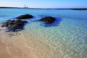 El Cotillo beach and Toston lighthouse at Fuerteventura Canary Islands