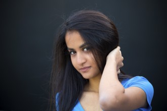 Portrait of a cheerful young woman - outdoor shot in summer