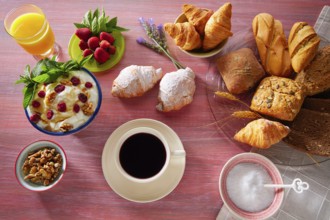 Coffe breakfast with orange juice croissant bread and strawberries