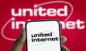 united internet logo is displayed on smartphone. United Internet AG is a global Internet services