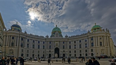 Hofburg Palace in Vienna under a partly cloudy sky and bright sun, Sisi Museum, Vienna, Austria,