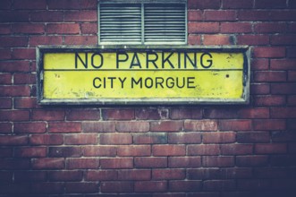 A No Parking Sign Outside A City Morgue In A US City