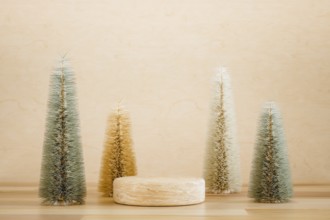 Wooden podium pedestal product mockup display with miniature Christmas trees in beige and green, 3d