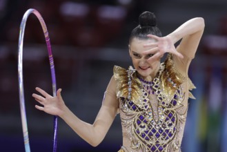 Sofia, Bulgaria - 27 March, 2021: Alina Harnasko of Belarus performs during the individual Hoop