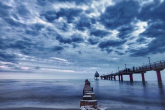 The pier in Zingst at blue hour with a long exposure. A torist attraction. Beautiful and pure