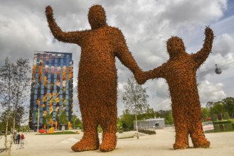 Almere, Netherlands, May 2022. The Arnhem giants and the Flores residential tower at the Floriade