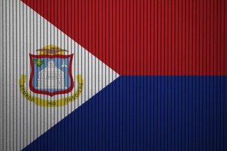 Sint Maarten Flag painted on the cracked grunge concrete wall