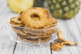 Some homemade Dried Pineapple Rings as detailed close-up shot, selective focus
