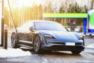 Porsche Taycan 4S electric car charging at Ionity. Paimio, Finland Jan 23, 21. Debuted in 2020,