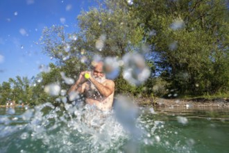 An image of a water battle at the summer lake