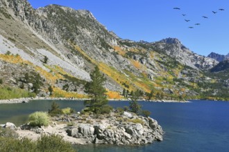 Fishing paradise. Azure lake in autumn mountains