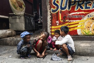 Poor street children at Analakely Market Antanarivo, Madagascar, Africa
